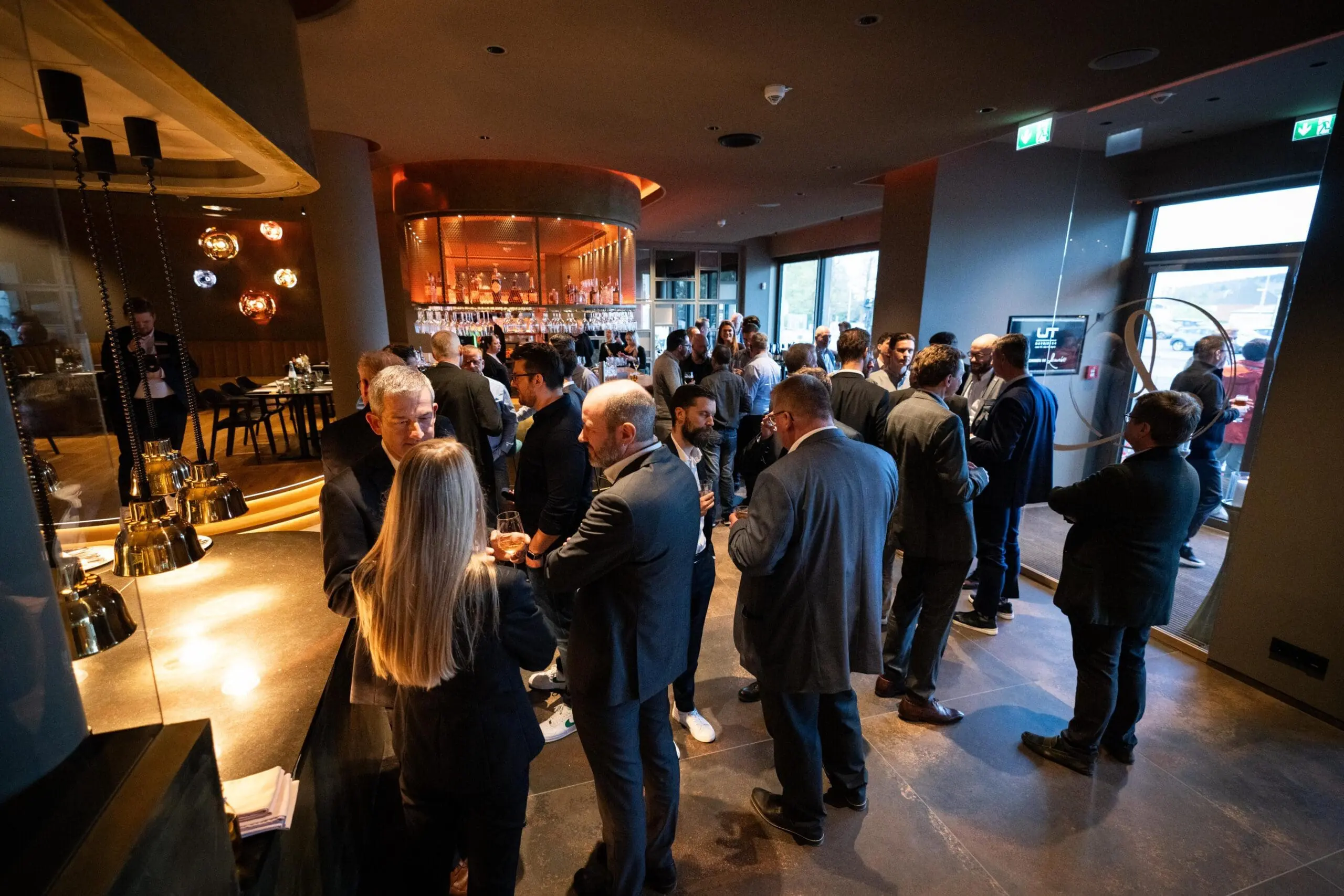Business professionals networking at a corporate event.