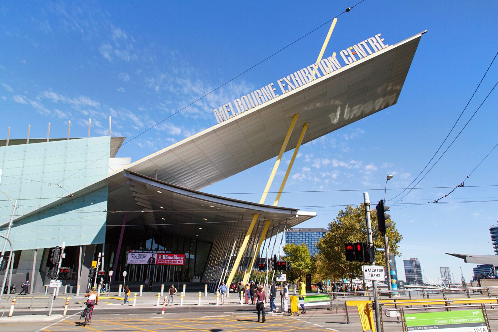 Melbourne Exhibition Centre entrance with clear blue sky.