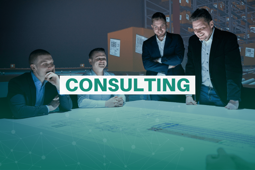 Business professionals consulting in a warehouse setting.