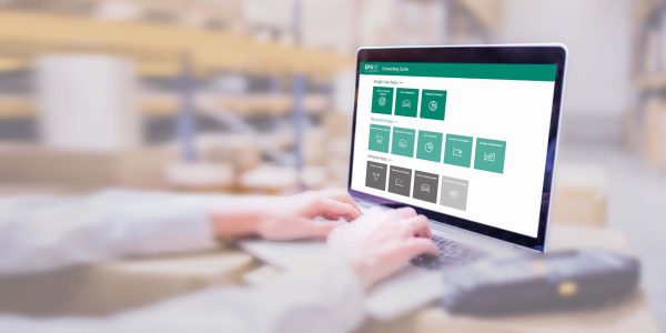 Person using business applications on laptop.