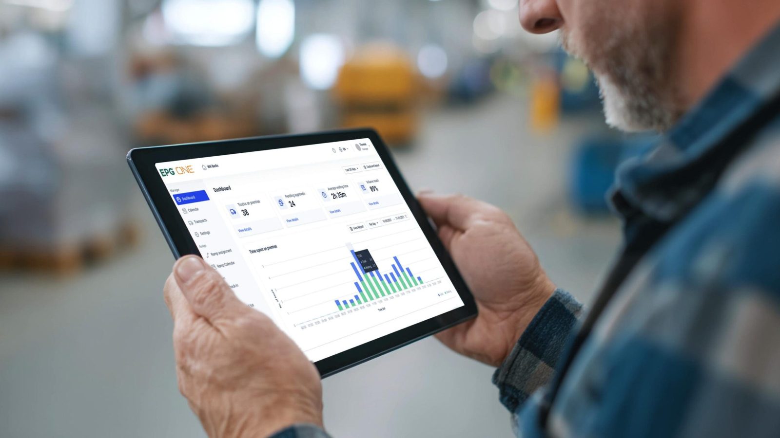 Person analyzing dashboard data on a tablet.